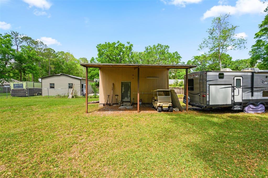 6820 Southwest 78th Street Gainesville, FL 32608 - Photo 36 of 41 a view of a house with backyard porch and garden