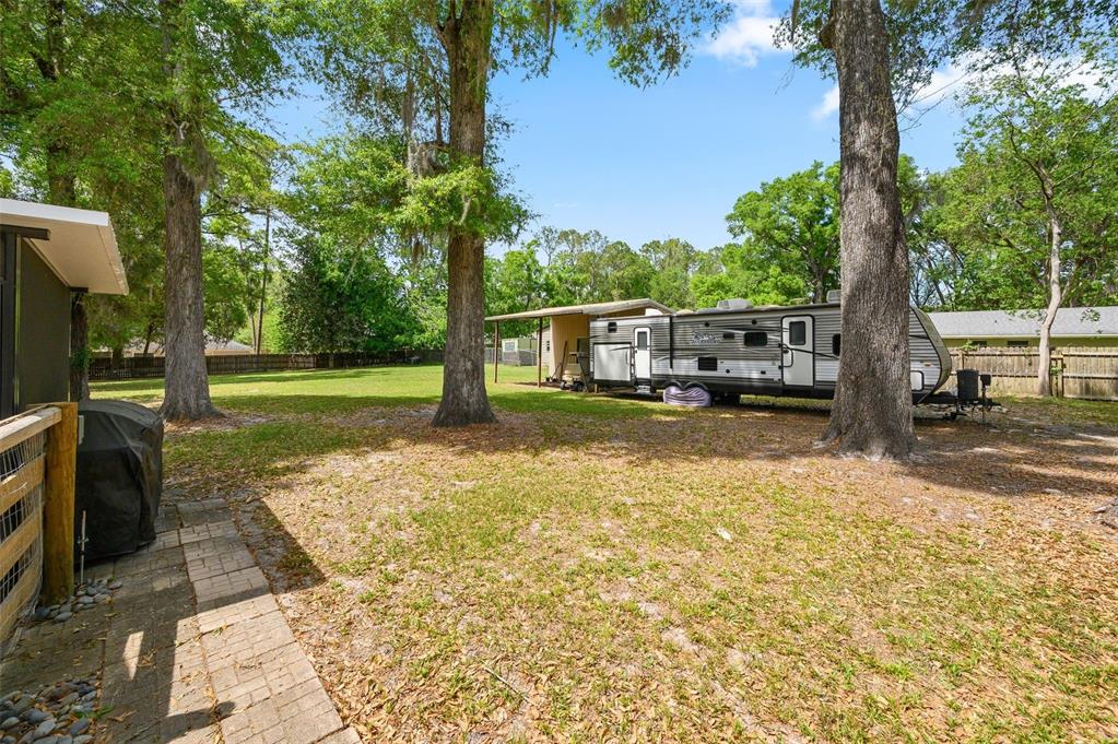 6820 Southwest 78th Street Gainesville, FL 32608 - Photo 38 of 41 a view of a swimming pool with a patio
