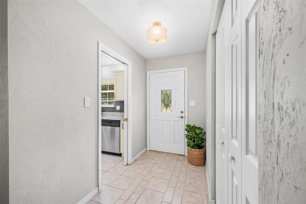 6820 Southwest 78th Street Gainesville, FL 32608 - Photo 4 of 41 a view of a hallway to rooms and stairs