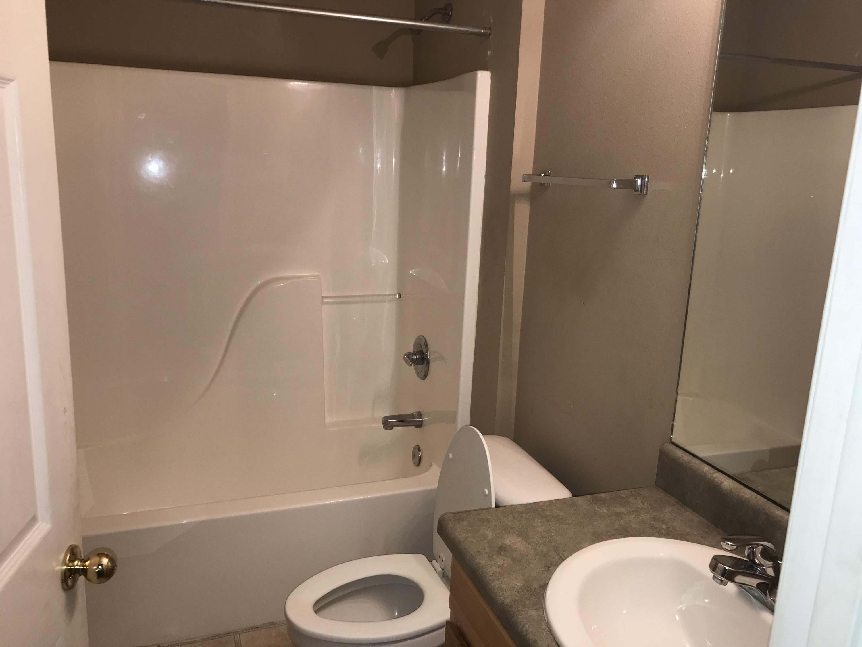 220 Tiffot Court Crestview, FL 32539 - Photo 15 of 15 a bathroom with a sink toilet and shower