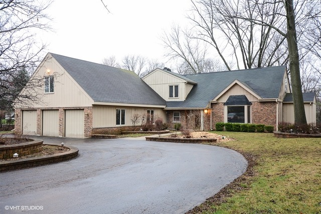 a view of a house with a sink and yard