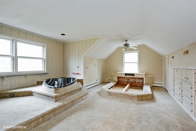 356 South Ela Road Inverness, IL 60010 - Photo 15 of 25 a living room with a couch and a window