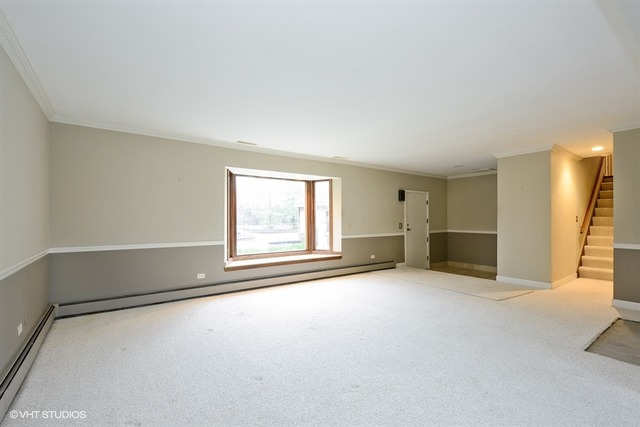 356 South Ela Road Inverness, IL 60010 - Photo 2 of 25 an empty room with windows
