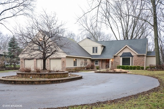 356 South Ela Road Inverness, IL 60010 - Photo 25 of 25 a front view of building with yard and trees around