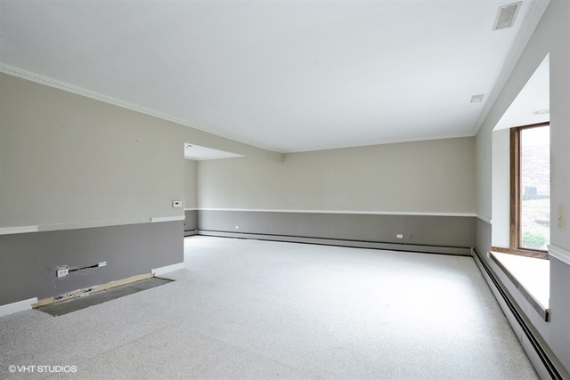 356 South Ela Road Inverness, IL 60010 - Photo 3 of 25 an empty room with windows