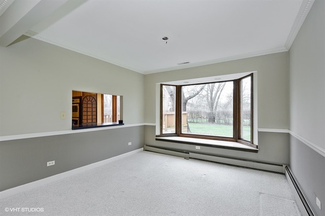 356 South Ela Road Inverness, IL 60010 - Photo 4 of 25 a view of an empty room with a window