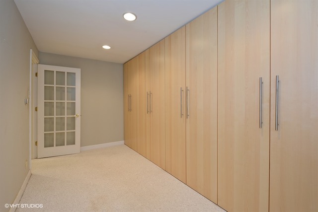 356 South Ela Road Inverness, IL 60010 - Photo 10 of 25 a view of an empty room with wooden floor