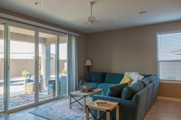 a living room with furniture and a window