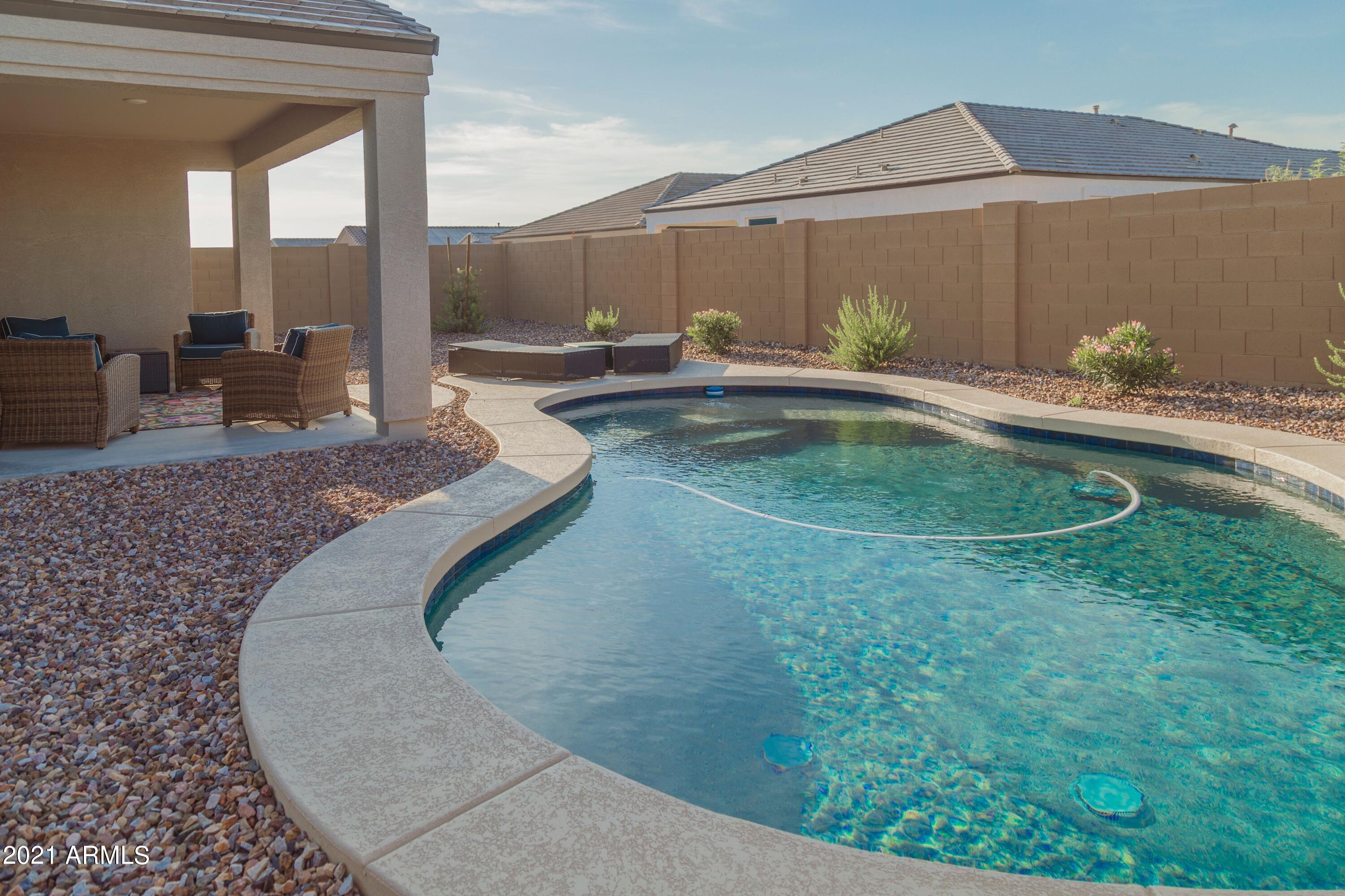 8555 West Georgetown Way Florence, AZ 85132 - Photo 9 of 11 swimming pool view with a outdoor seating