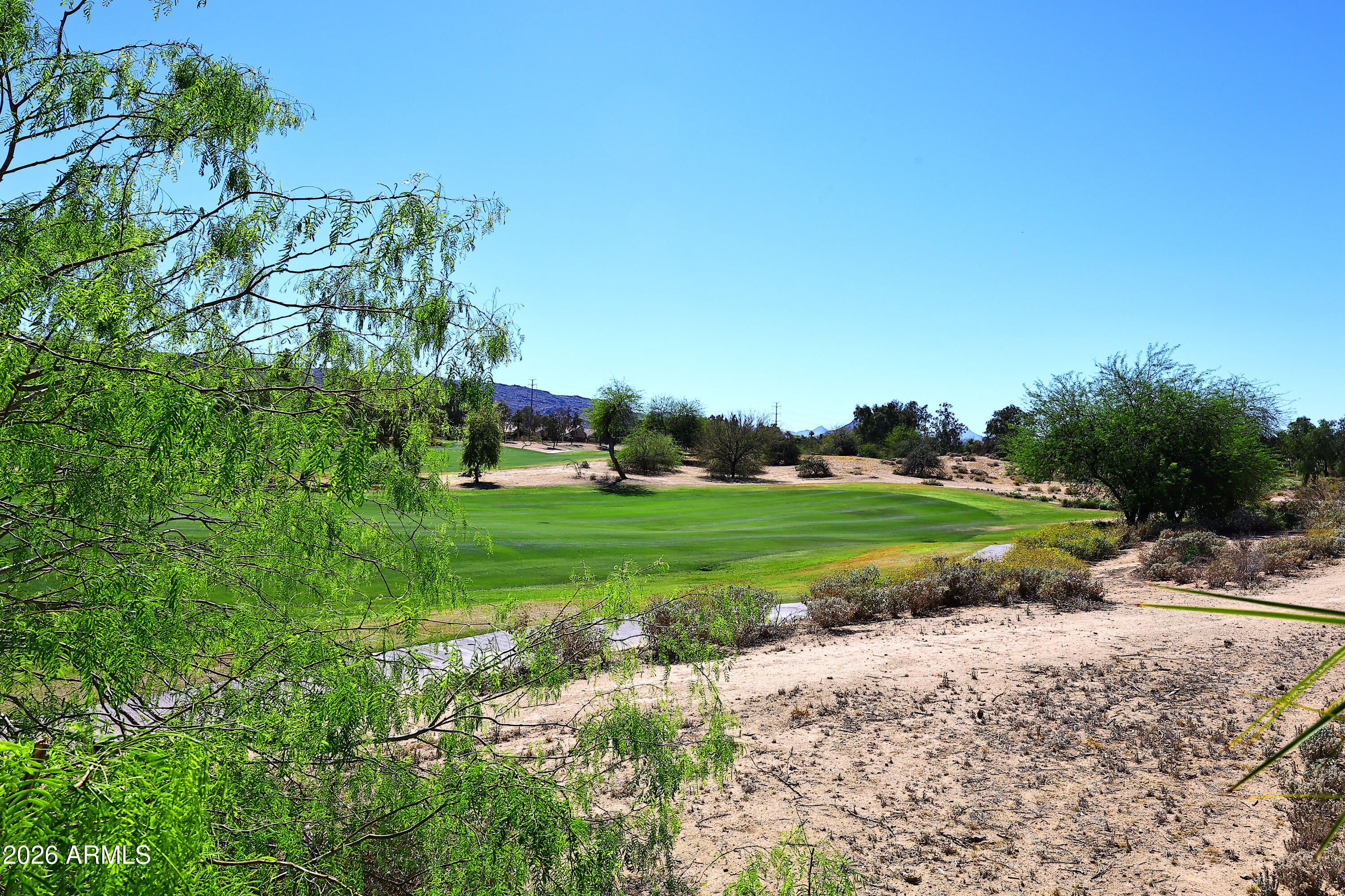 2635 East Darrel Road Phoenix, AZ 85042 - Photo 16 of 27 a view of grassy field with benches