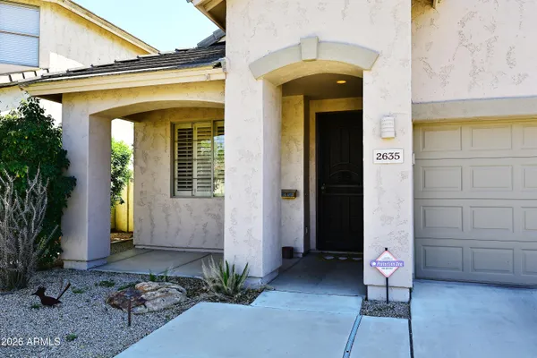 a view of a entryway door front of house