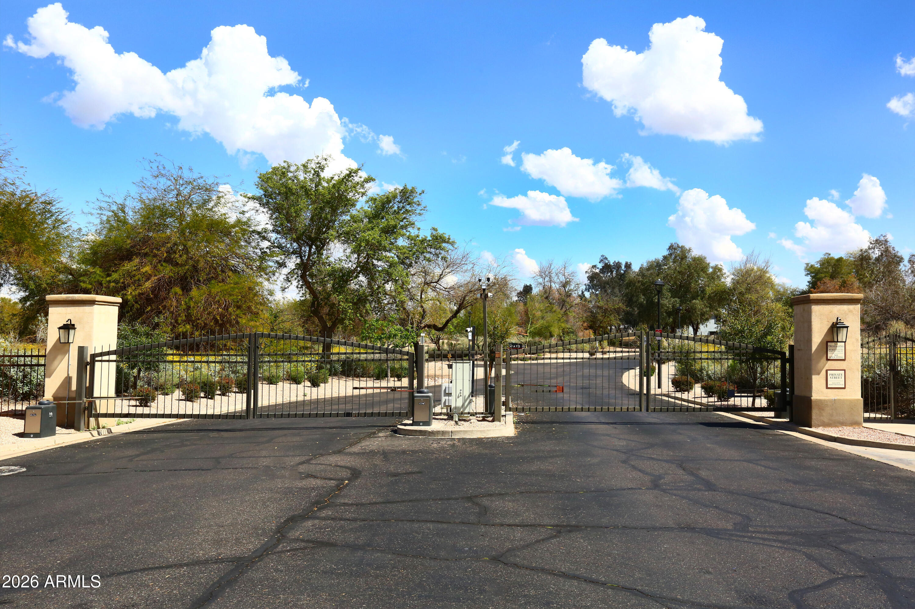 2635 East Darrel Road Phoenix, AZ 85042 - Photo 21 of 27 a view of a street with houses