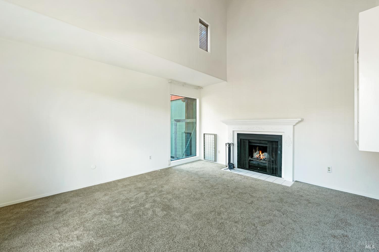 5550 Pepperwood Road Santa Rosa, CA 95409 - Photo 16 of 35 a view of an empty room with a fireplace