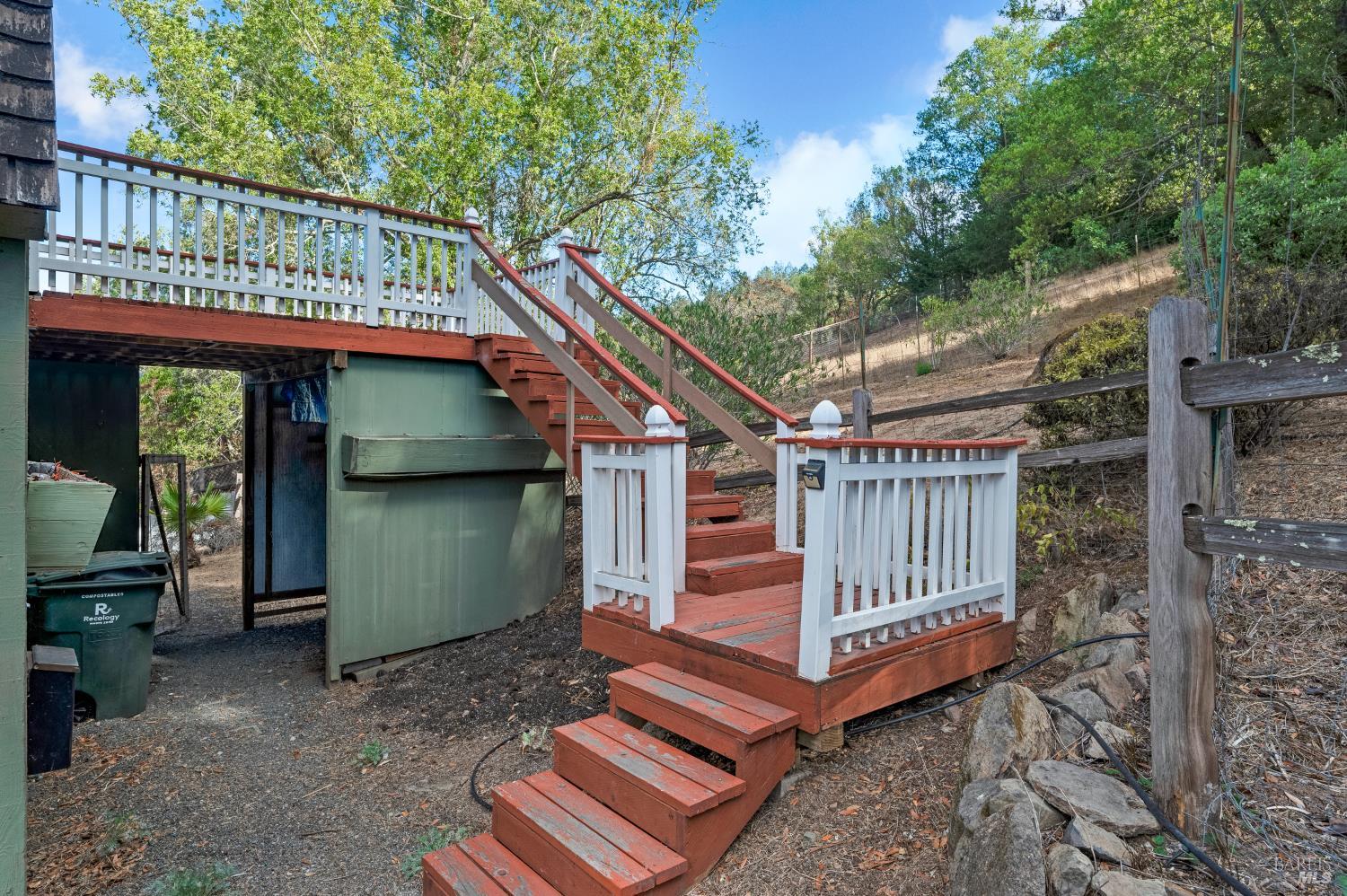 5550 Pepperwood Road Santa Rosa, CA 95409 - Photo 22 of 35 a view of a small house with a deck