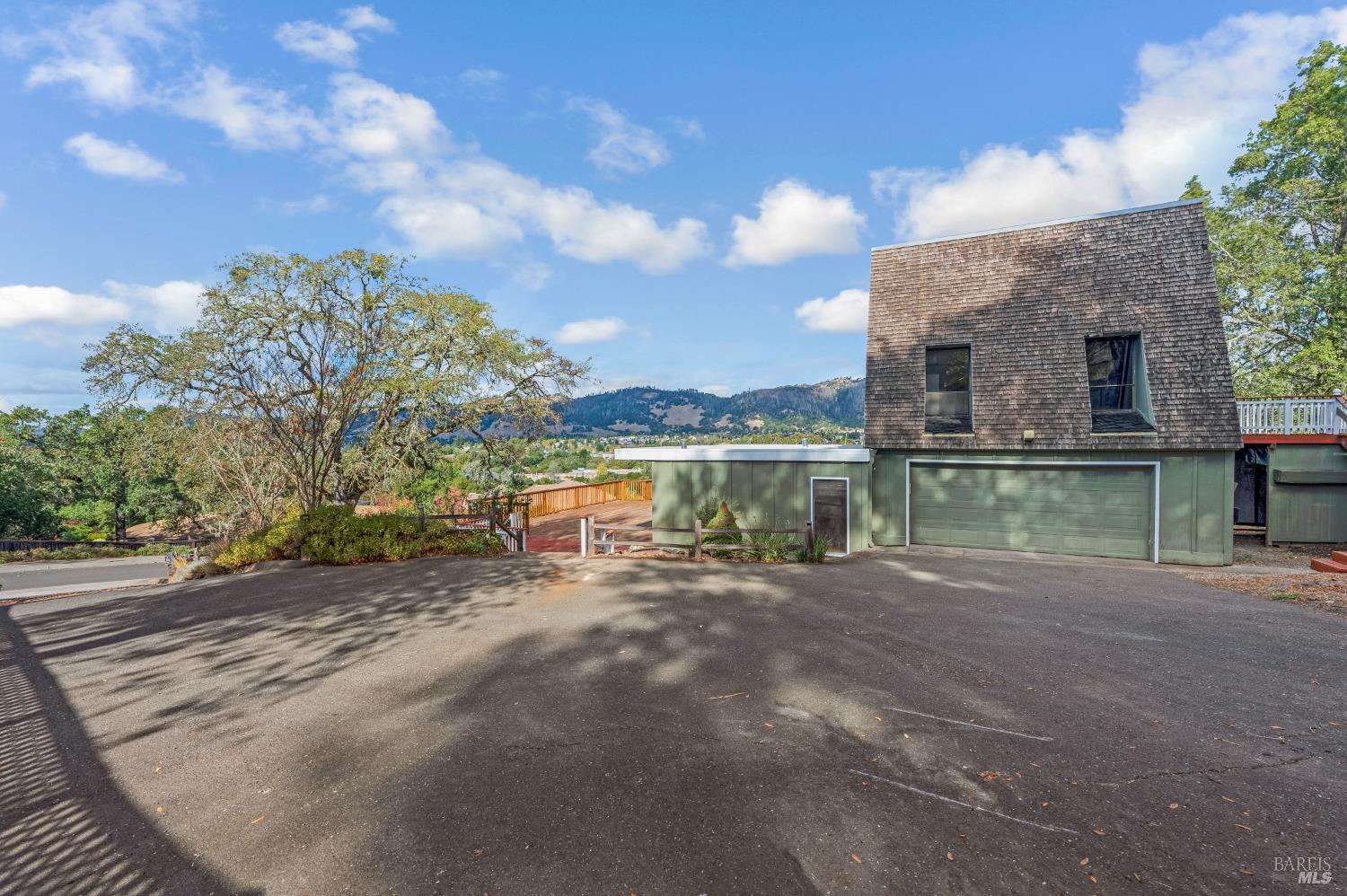 5550 Pepperwood Road Santa Rosa, CA 95409 - Photo 33 of 35 a view of a lake with a building in the background