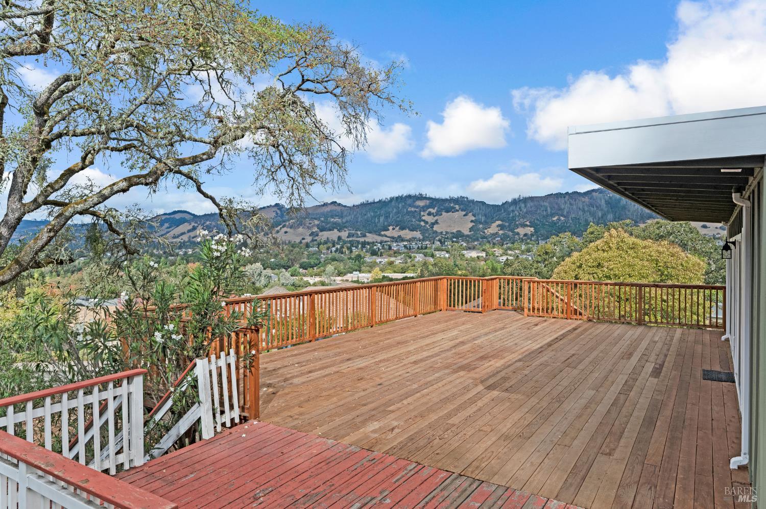 5550 Pepperwood Road Santa Rosa, CA 95409 - Photo 7 of 35 a view of balcony with wooden floor and lake view