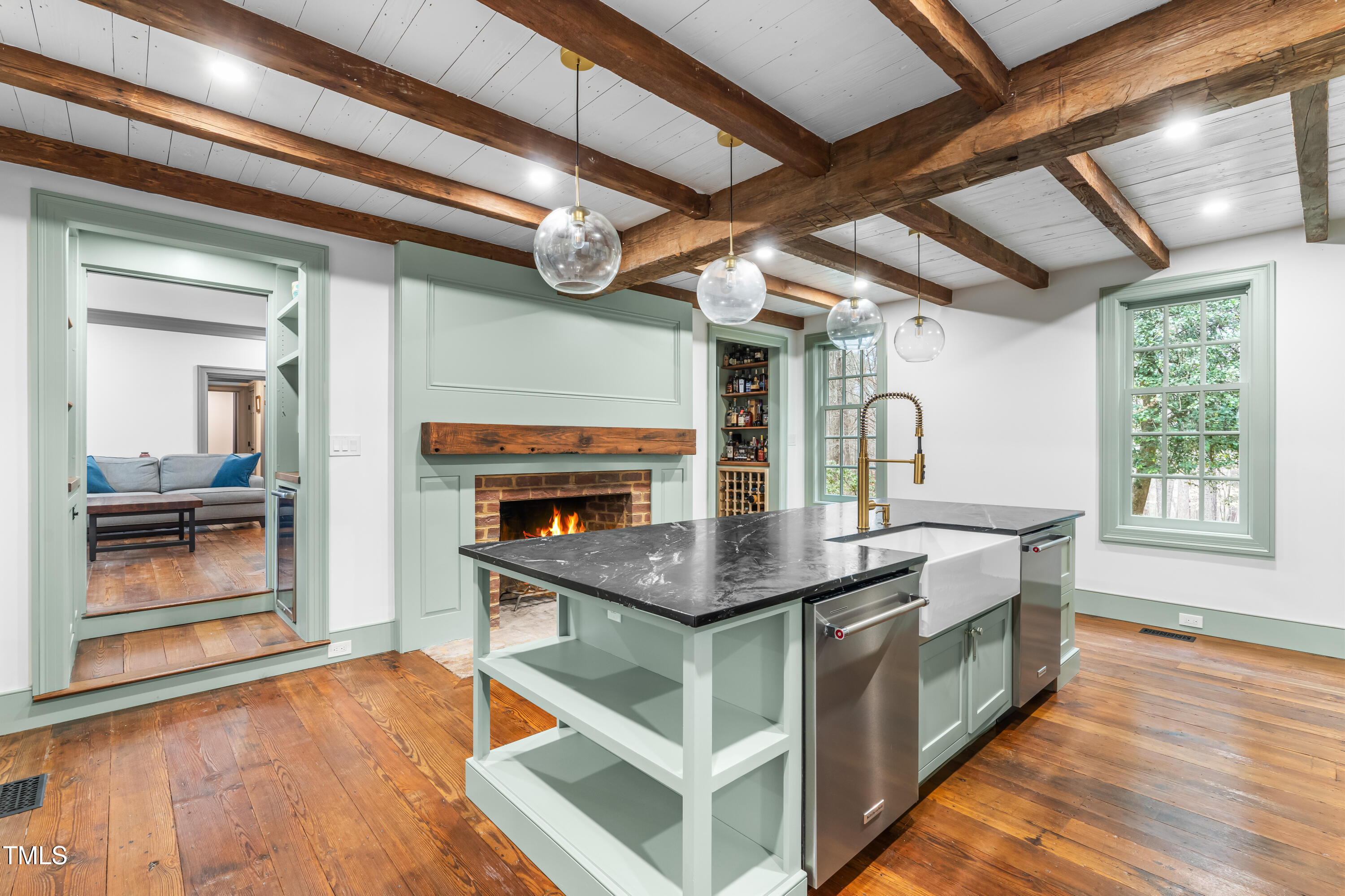 10726 Trego Trail Raleigh, NC 27614 - Photo 24 of 55 Kitchen has a wood-burning fireplace