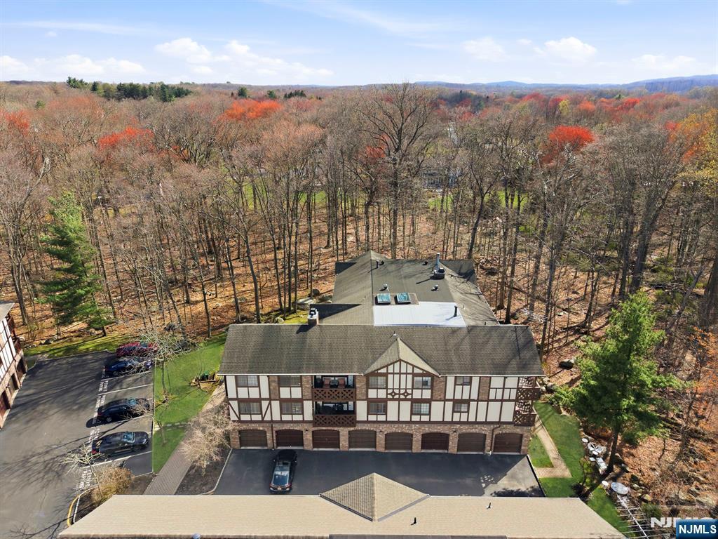 2309 Hemingway Lane, Unit 2309 Mahwah, NJ 07430 - Photo 22 of 28 an aerial view of a houses with a street