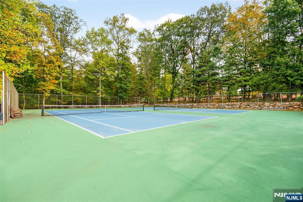 2309 Hemingway Lane, Unit 2309 Mahwah, NJ 07430 - Photo 25 of 28 a view of a tennis court