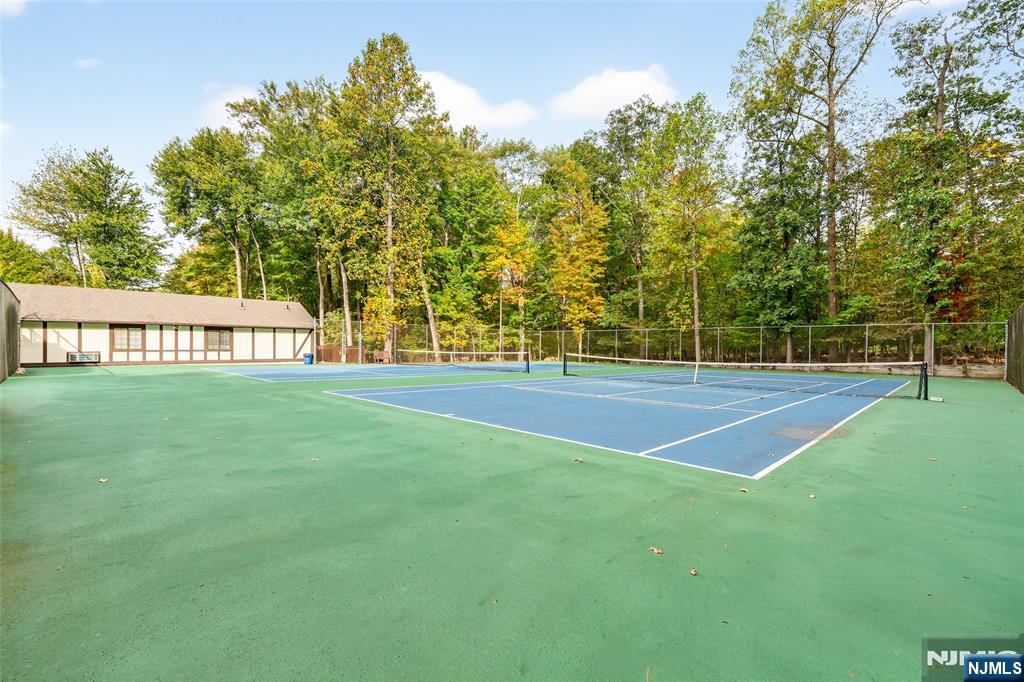 2309 Hemingway Lane, Unit 2309 Mahwah, NJ 07430 - Photo 26 of 28 a view of a tennis court