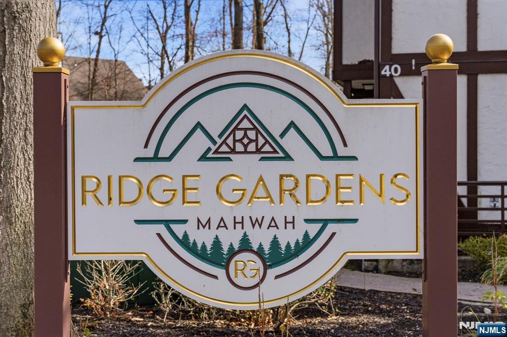 2309 Hemingway Lane, Unit 2309 Mahwah, NJ 07430 - Photo 27 of 28 a sign that is on top of a pole
