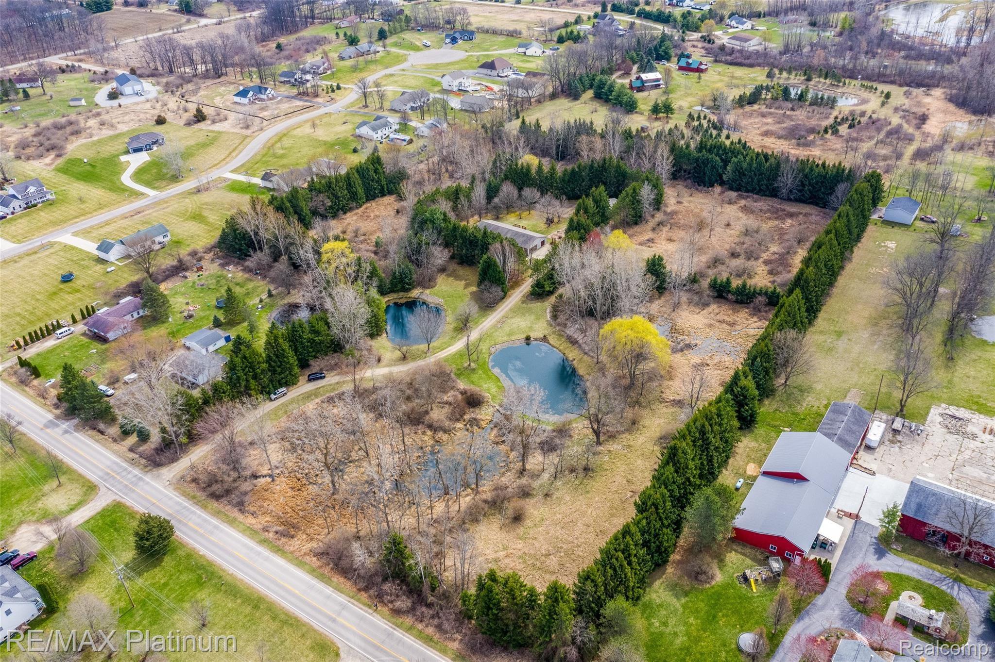 909 Chase Lake Road Howell, MI 48855 - Photo 34 of 37 Gorgeous aerial view of 909 Chase Lake Road!