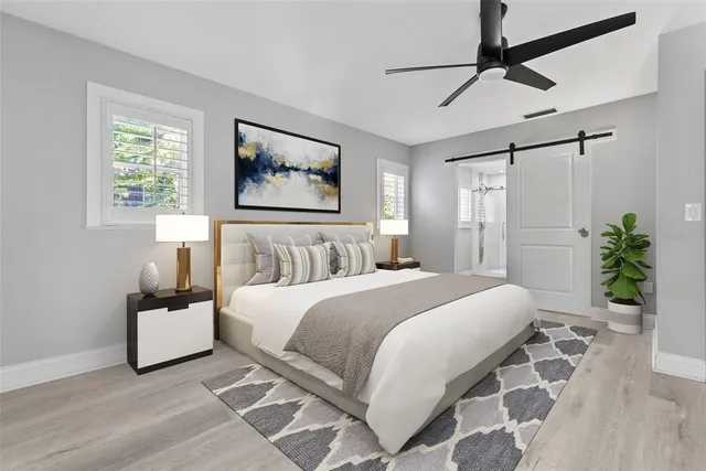 a bathroom with a shower and a sink