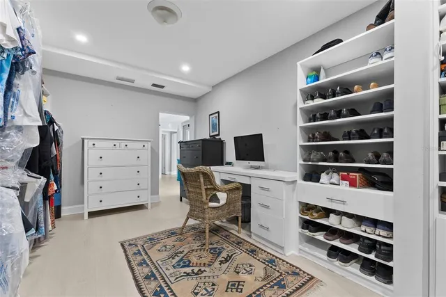a living room with furniture and a rug