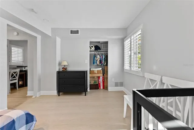 a bathroom with a sink toilet and a mirror