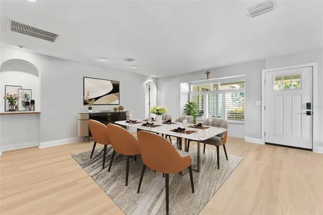 a view of a dining room with furniture