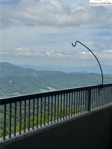 a balcony with wooden floor