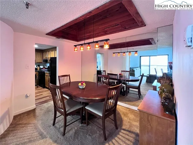 a view of a dining room with furniture