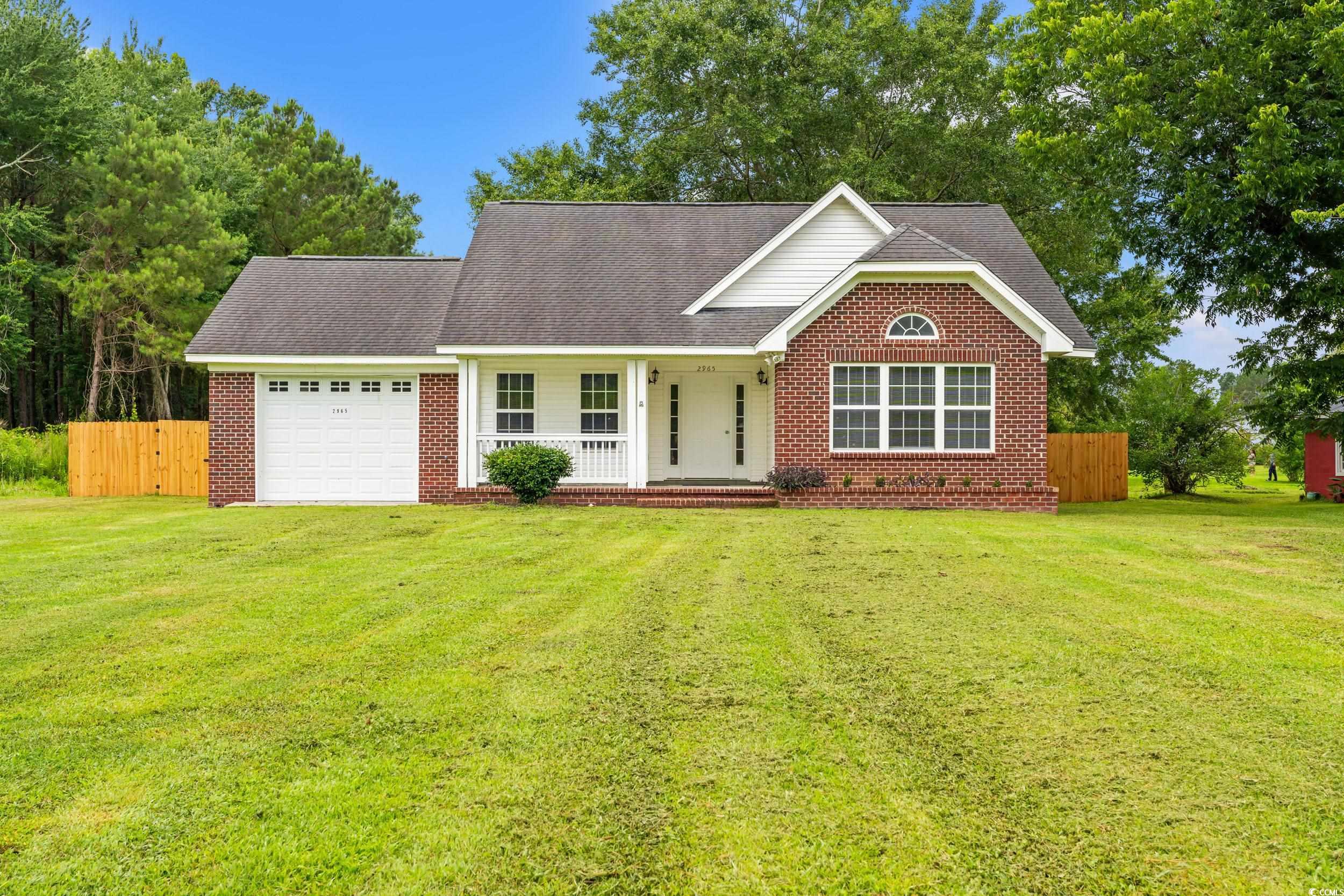 2965 Mt Olive Road Loris, SC 29569 - Photo 1 of 35 View of front of home with an attached garage, cov