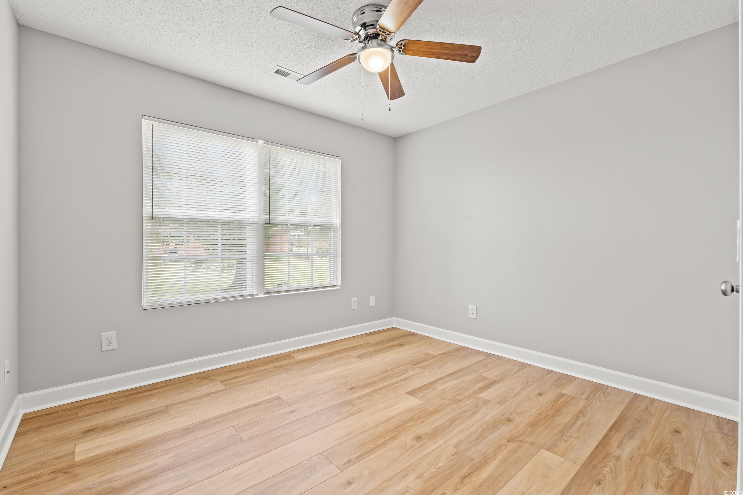 2965 Mt Olive Road Loris, SC 29569 - Photo 20 of 35 Unfurnished room featuring light wood-style floors