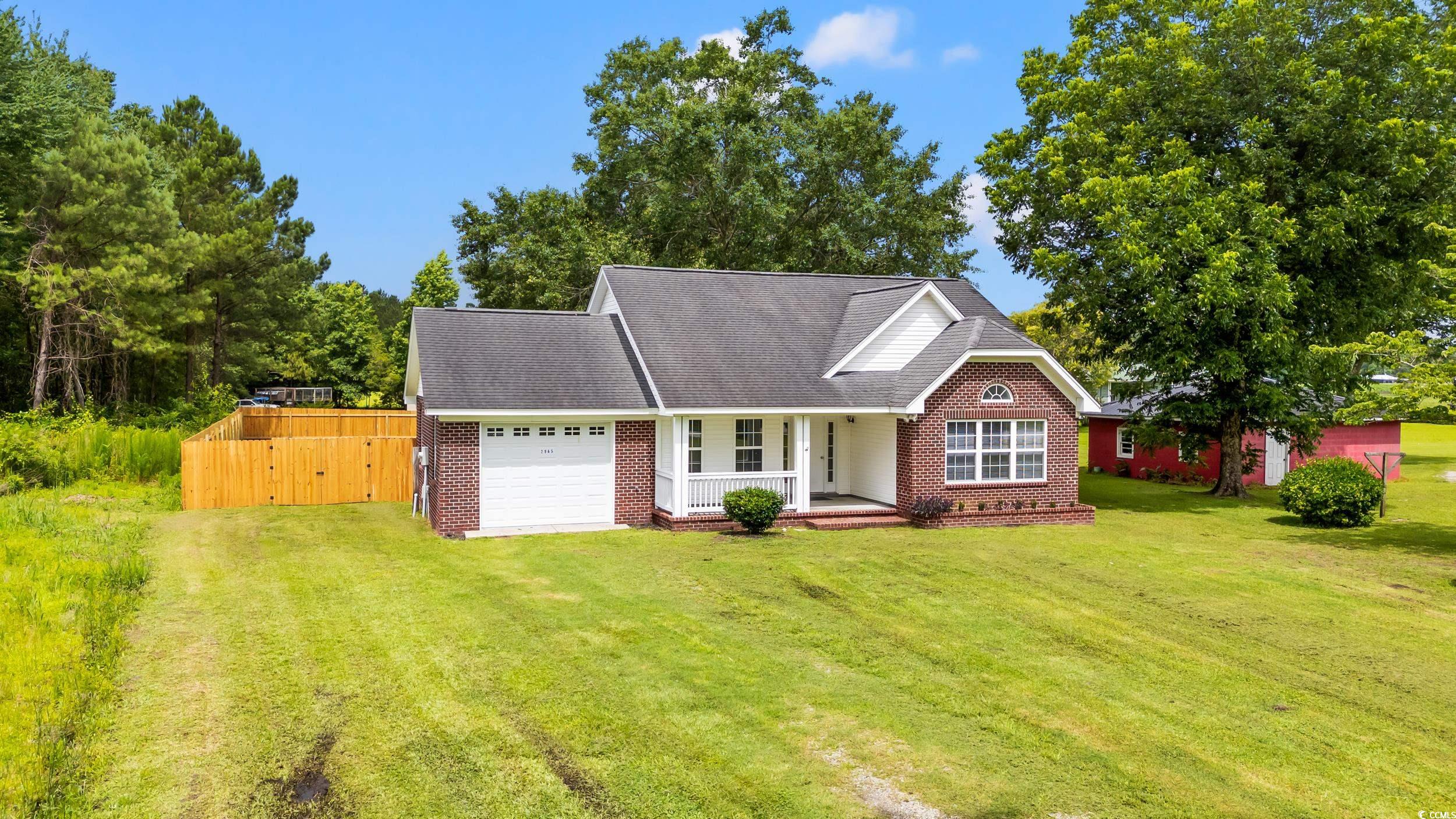 2965 Mt Olive Road Loris, SC 29569 - Photo 2 of 35 View of front of property featuring an attached ga