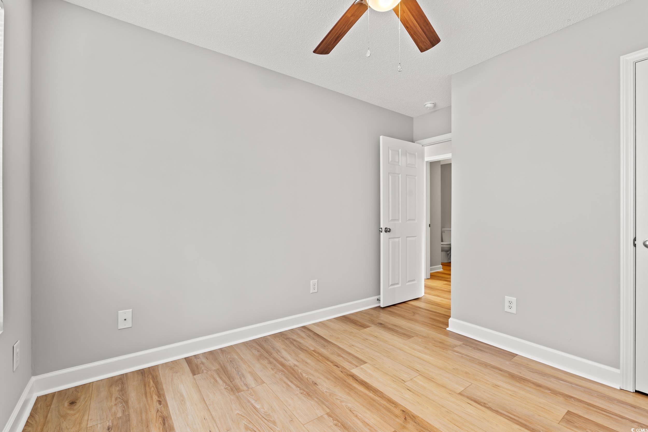 2965 Mt Olive Road Loris, SC 29569 - Photo 22 of 35 Unfurnished bedroom with light wood finished floor