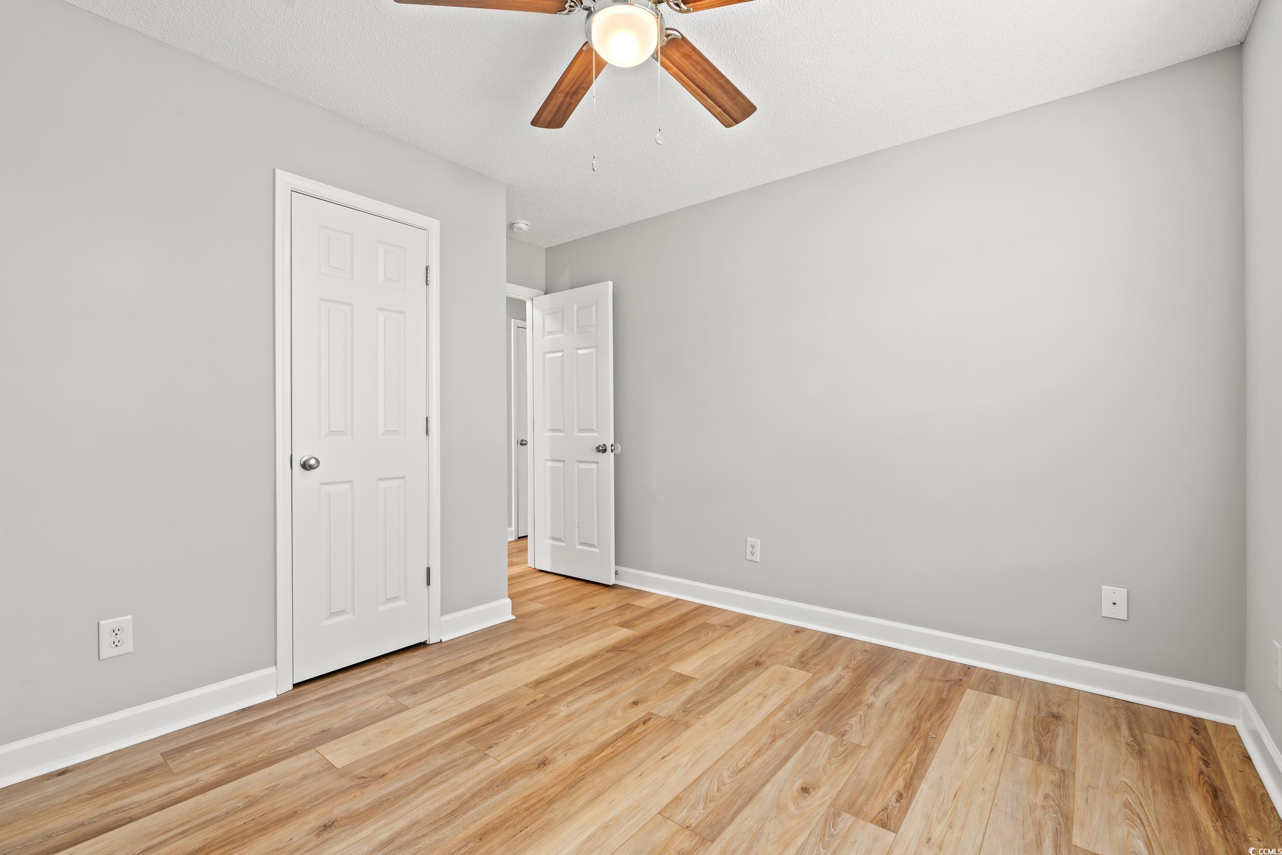 2965 Mt Olive Road Loris, SC 29569 - Photo 23 of 35 Unfurnished bedroom with light wood-style floors a