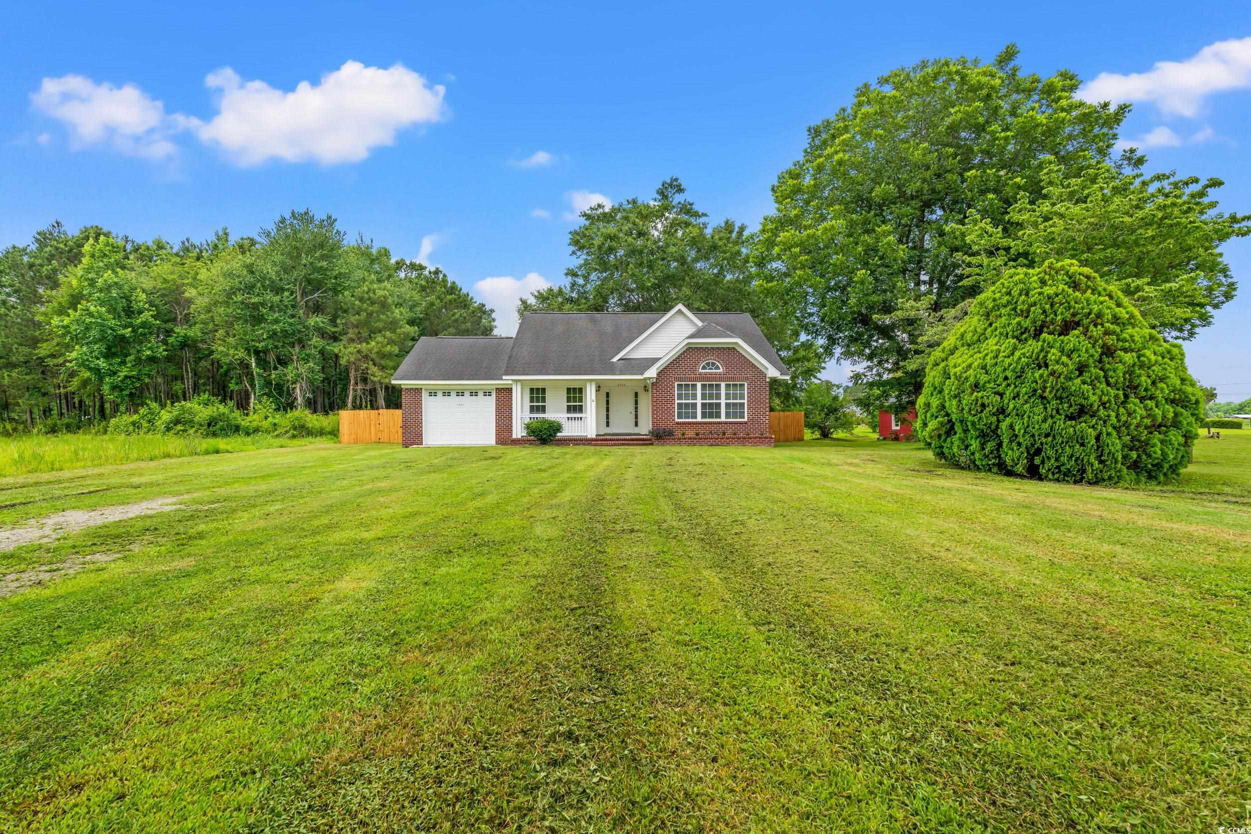 2965 Mt Olive Road Loris, SC 29569 - Photo 3 of 35 View of front facade with an attached garage, a fr
