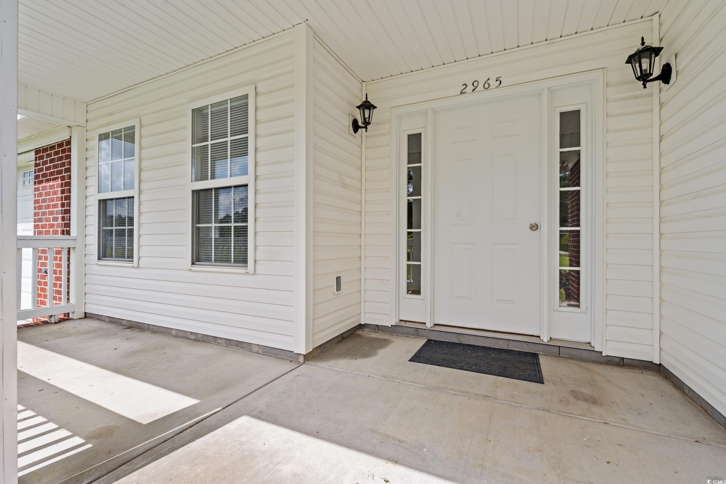 2965 Mt Olive Road Loris, SC 29569 - Photo 4 of 35 Doorway to property featuring a porch