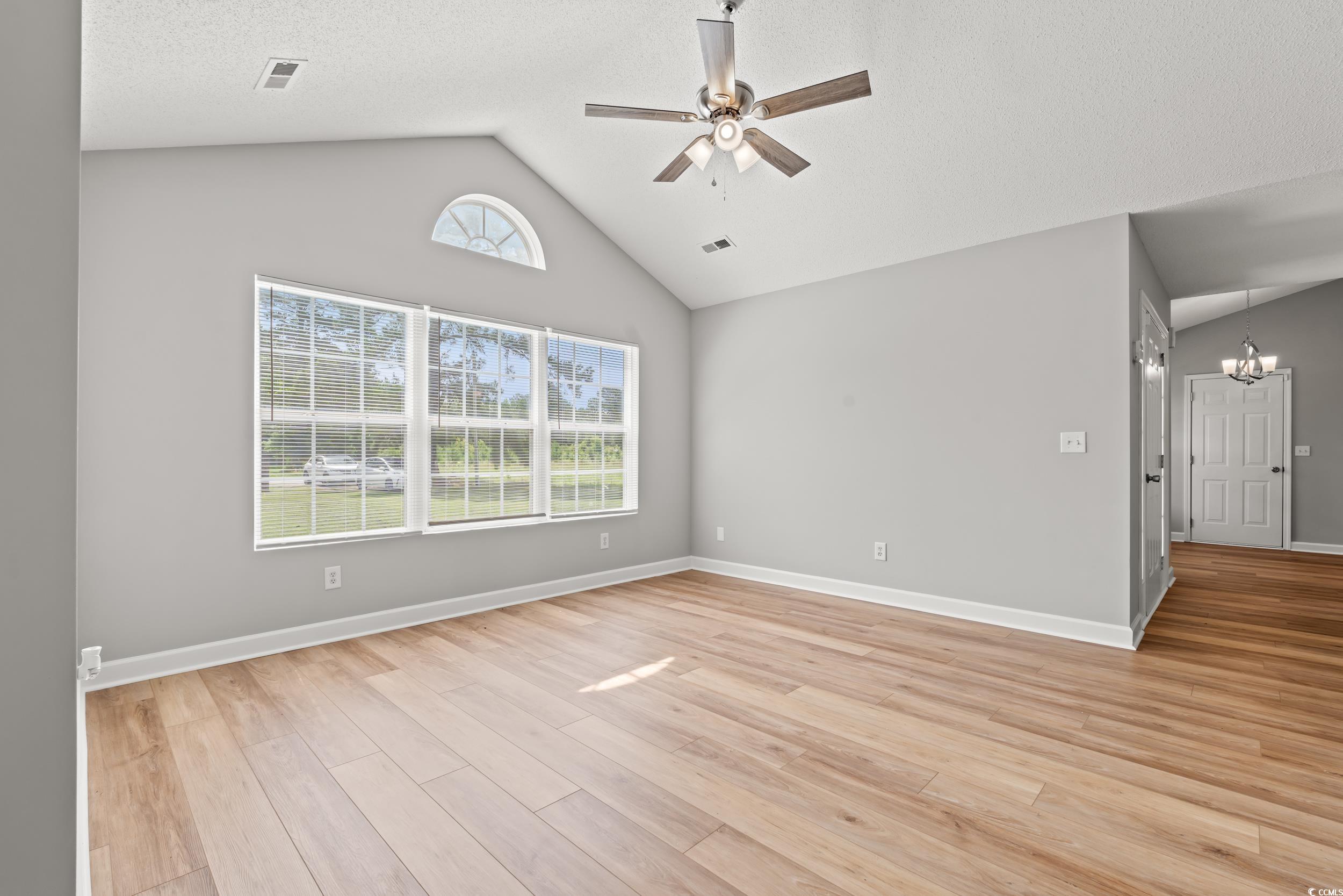 2965 Mt Olive Road Loris, SC 29569 - Photo 8 of 35 Unfurnished room featuring vaulted ceiling, a chan