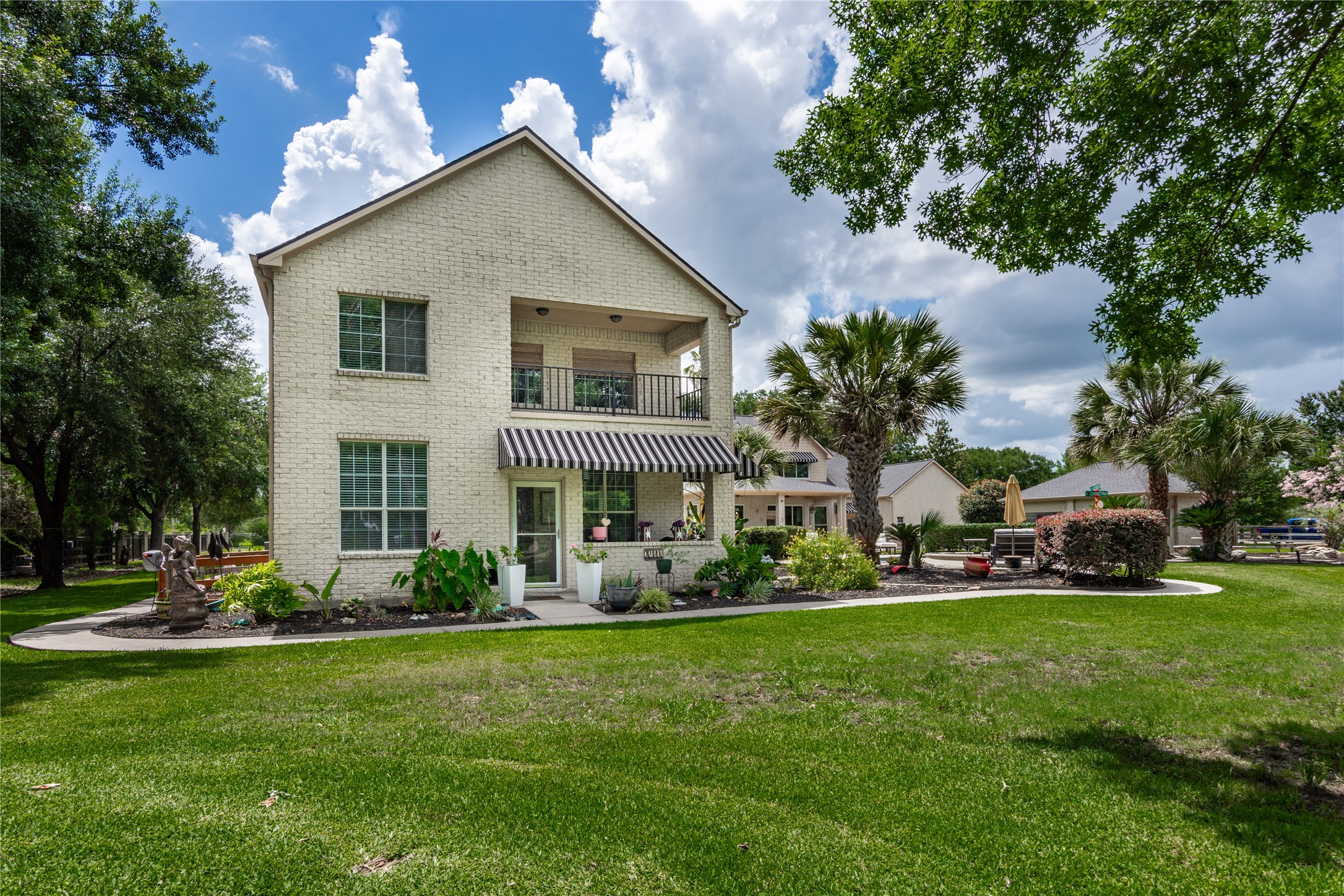 13914 Skinner Road Cypress, TX 77429 - Photo 26 of 50 Two story secondary residence with a private patio, and upper balcony.