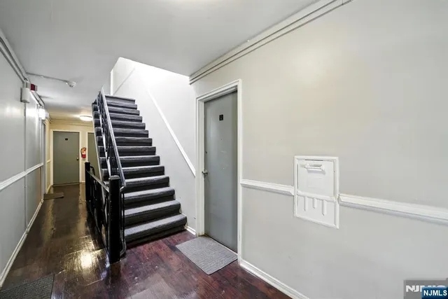 a view of entryway with wooden floor