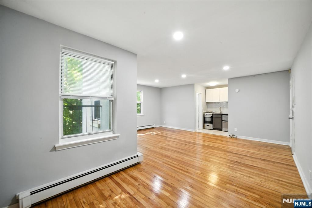 819 Bloomfield Avenue, Unit 12 Montclair, NJ 07042 - Photo 4 of 9 a view of an empty room with a window