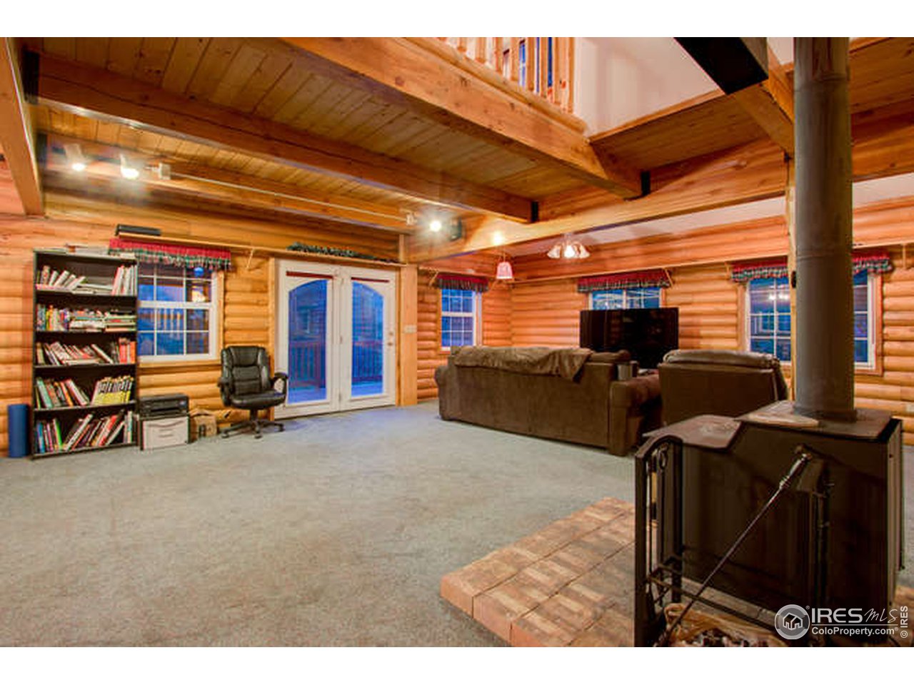 565 Rustic Road Bellvue, CO 80512 - Photo 18 of 40 Wood burning fireplace/stove