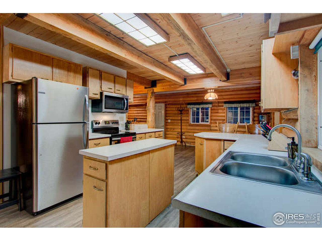 565 Rustic Road Bellvue, CO 80512 - Photo 22 of 40 island and pantry