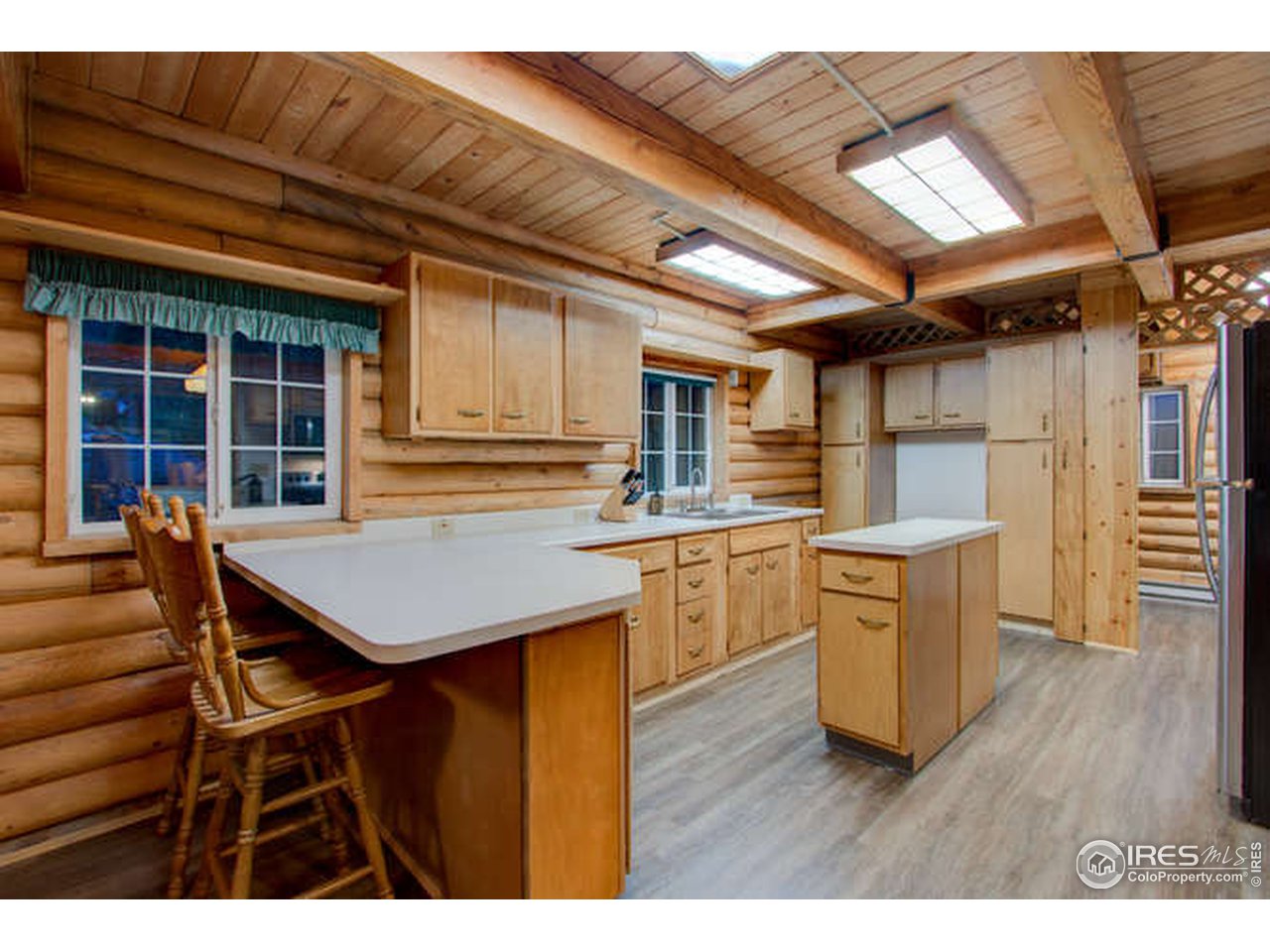 565 Rustic Road Bellvue, CO 80512 - Photo 23 of 40 Plenty of cabinets and counter space