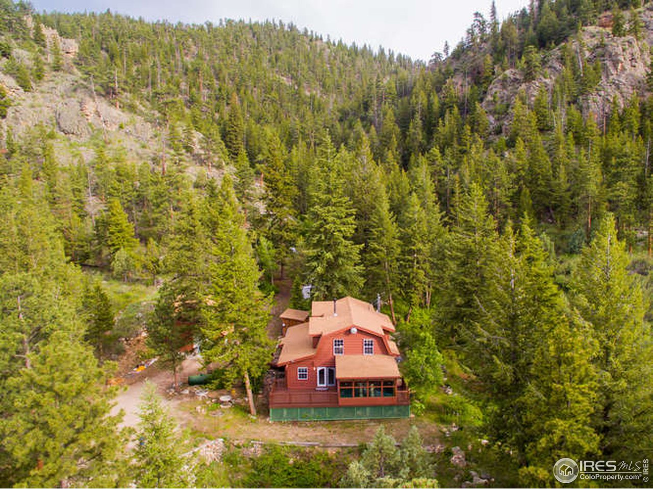 565 Rustic Road Bellvue, CO 80512 - Photo 4 of 40 Flowing Creek through property