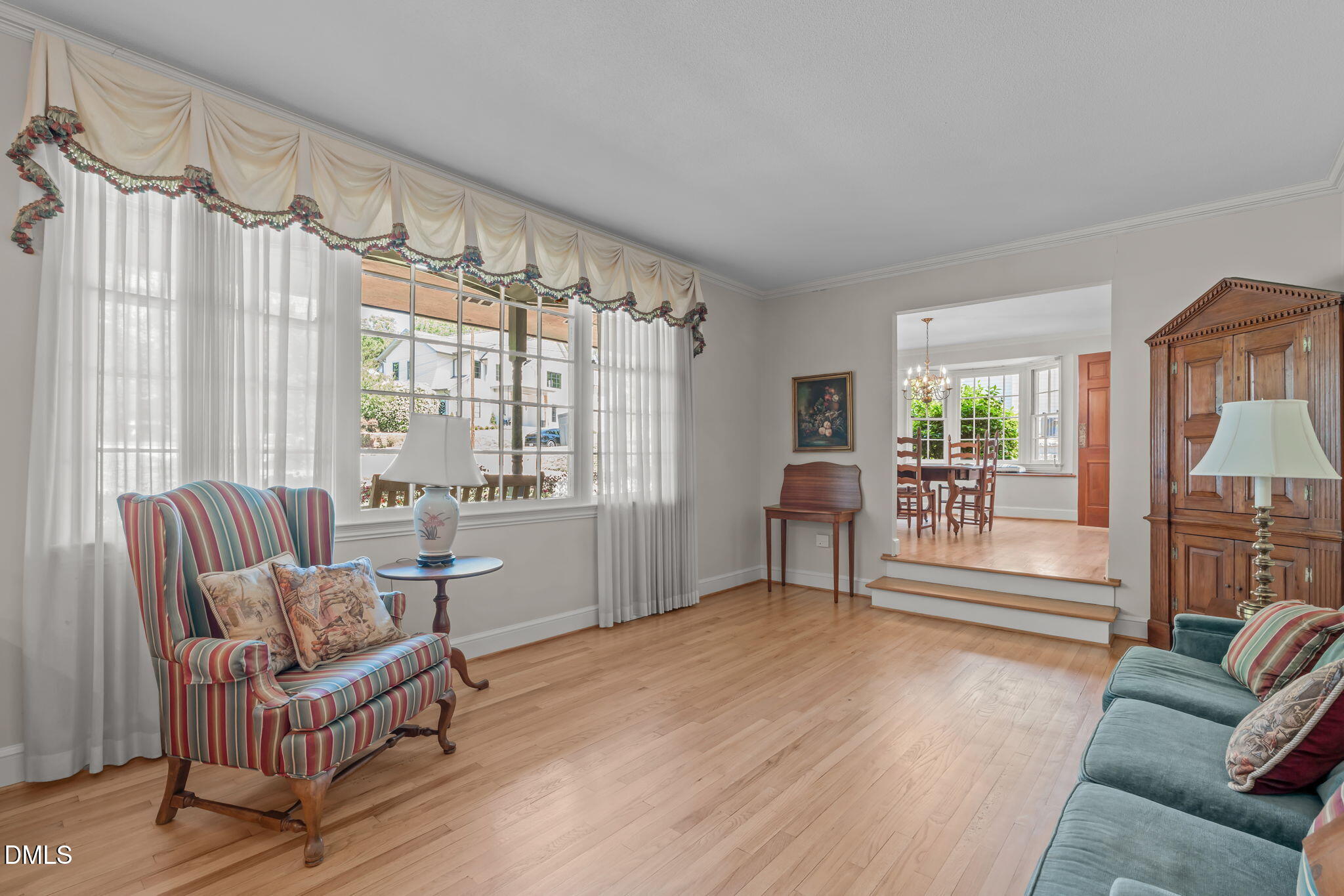 1205 Kimberly Drive Raleigh, NC 27609 - Photo 13 of 45 a living room with furniture and a large window