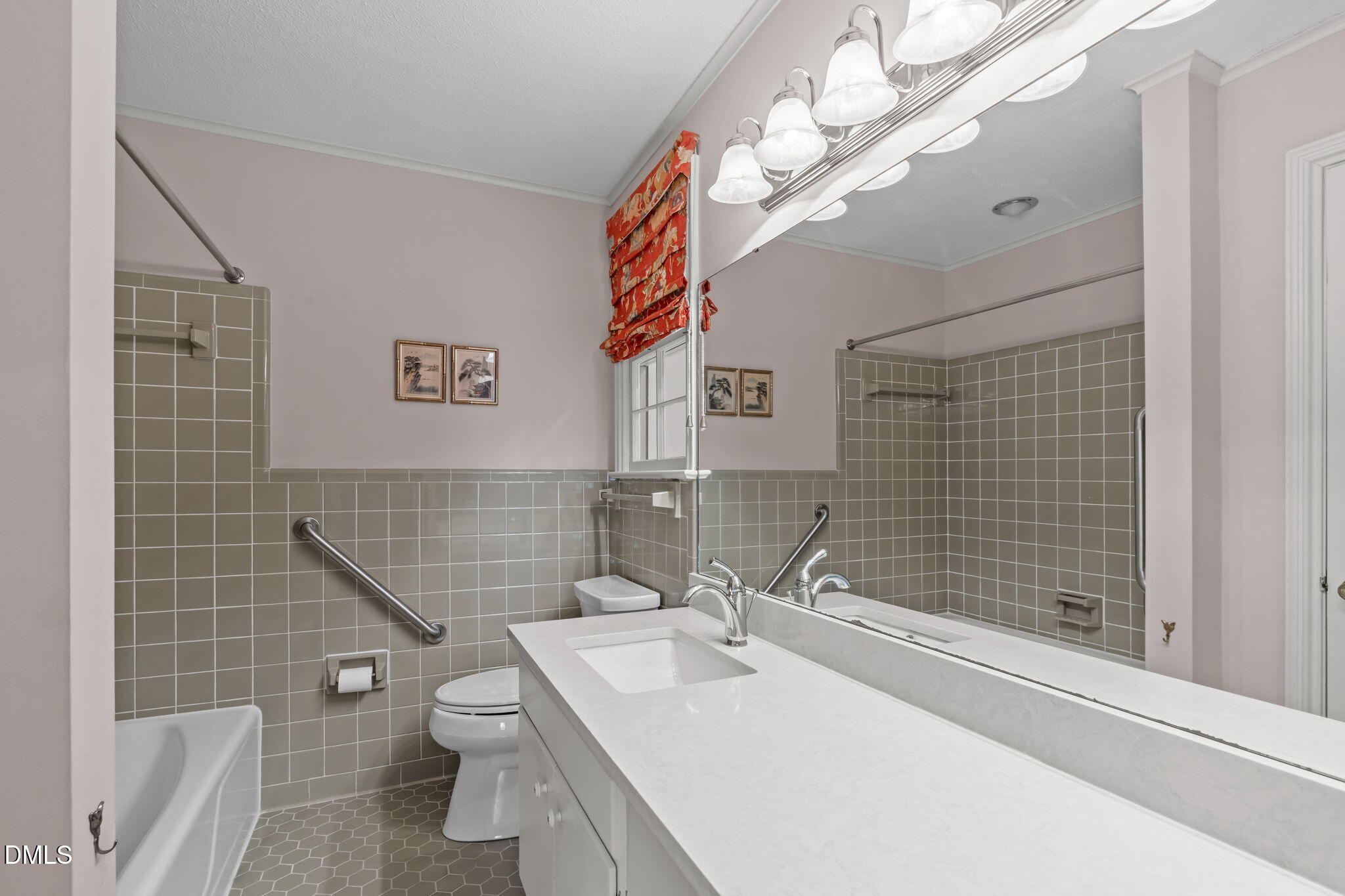 1205 Kimberly Drive Raleigh, NC 27609 - Photo 24 of 45 a bathroom with a sink a toilet and shower