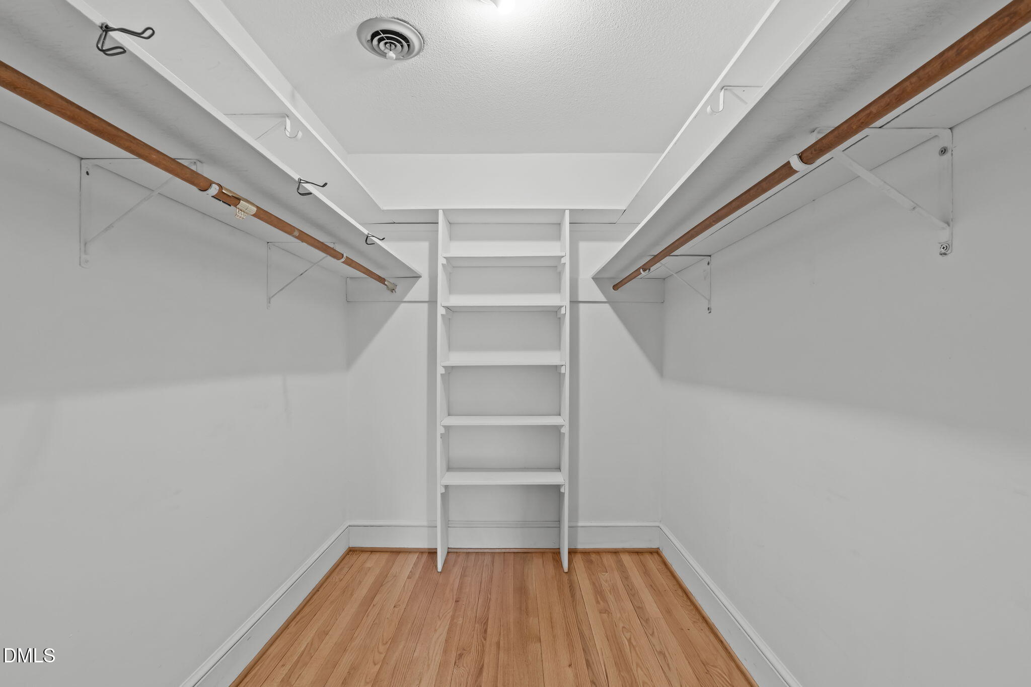1205 Kimberly Drive Raleigh, NC 27609 - Photo 25 of 45 a view of a room with wooden floor and closet